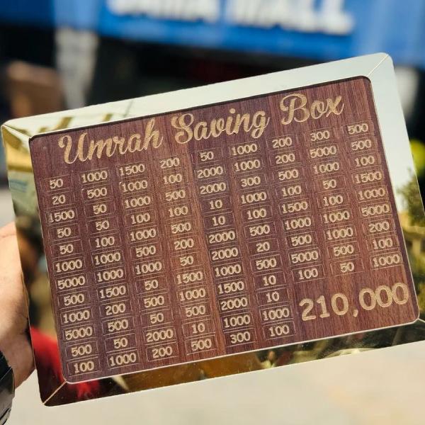 Wooden Umrah saving box with engraved amount grid