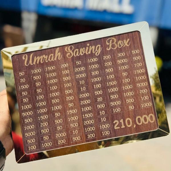Wooden Umrah saving box with engraved amount grid